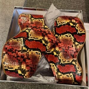 Red snake skin platform clogs
